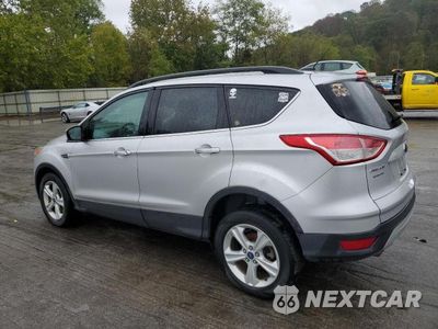 Trzecie zdjęcie samochodu z tyłu: 2014 FORD ESCAPE SE VIN:1FMCU9GX5EUC69762 - miniatura