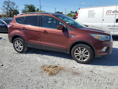 Czwarte zdjęcie samochodu z boku: 2018 FORD ESCAPE SE VIN:1FMCU9GD4JUA81475 - miniatura