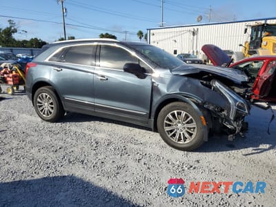 Czwarte zdjęcie samochodu z boku: 2019 CADILLAC XT5 LUXURY VIN:1GYKNCRS7KZ162538 - miniatura