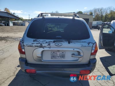 Zdjęcie 6 z 13 samochodu: 2003 HYUNDAI SANTA FE GL VIN:KM8SB12B43U553900 - miniatura