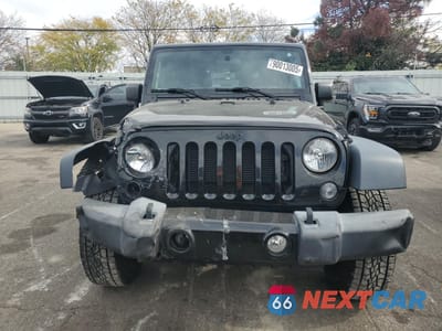 Piąte zdjęcie samochodu w środku: 2015 JEEP WRANGLER SPORT VIN:1C4AJWAG6FL678646 - miniatura