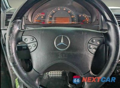 Zdjęcie 8 z 11 samochodu: 2002 MERCEDES-BENZ G 500 VIN:WDCYR49EX2X133092 - miniatura