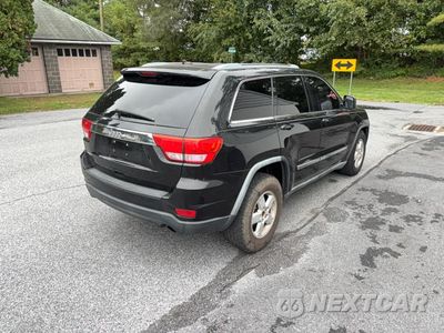 Czwarte zdjęcie samochodu z boku: 2011 JEEP GRAND CHEROKEE LAREDO VIN:1J4RR4GG7BC596730 - miniatura