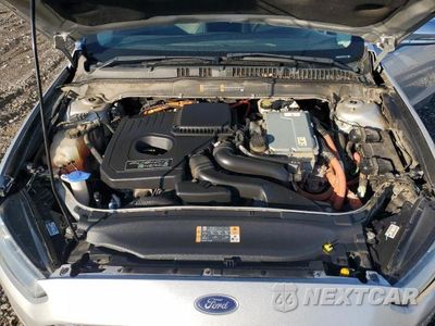 Zdjęcie 11 z 11 samochodu: 2013 FORD FUSION TITANIUM PHEV VIN:3FA6P0SU5DR274134 - miniatura