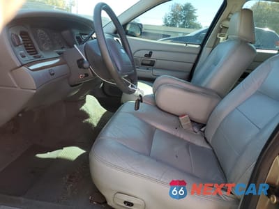 Zdjęcie 7 z 14 samochodu: 2004 FORD CROWN VICTORIA LX VIN:2FAFP74W84X150562 - miniatura