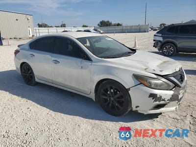 Czwarte zdjęcie samochodu z boku: 2017 NISSAN ALTIMA 2.5 VIN:1N4AL3AP1HC178976 - miniatura
