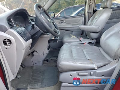 Zdjęcie 7 z 13 samochodu: 2002 HONDA ODYSSEY EXL VIN:2HKRL18022H535796 - miniatura