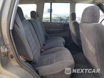 Zdjęcie 11 z 13 samochodu: 1997 JEEP GRAND CHEROKEE LAREDO VIN:1J4GZ58S9VC673117 - miniatura