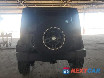 Zdjęcie 6 z 12 samochodu: 2012 JEEP WRANGLER UNLIMITED RUBICON VIN:1C4BJWFG4CL103454 - miniatura