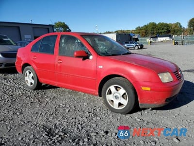 Czwarte zdjęcie samochodu z boku: 2002 VOLKSWAGEN JETTA VIN:3VWSK69M12M181828 - miniatura