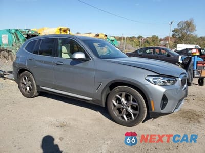Czwarte zdjęcie samochodu z boku: 2023 BMW X3 VIN:5UX53DP05P9S88810 - miniatura