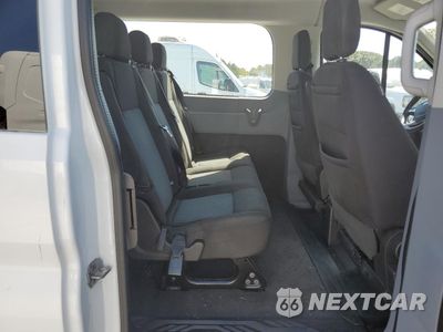 Zdjęcie 11 z 14 samochodu: 2017 FORD TRANSIT T-150 VIN:1FMZK1ZM1HKA86833 - miniatura