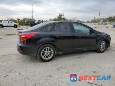 Trzecie zdjęcie samochodu z tyłu: 2018 FORD FOCUS SE VIN:1FADP3F22JL321132 - miniatura