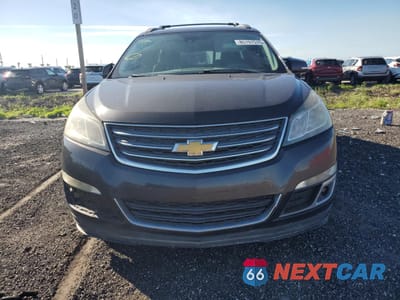 Piąte zdjęcie samochodu w środku: 2014 CHEVROLET TRAVERSE LT VIN:1GNKRHKD7EJ361571 - miniatura