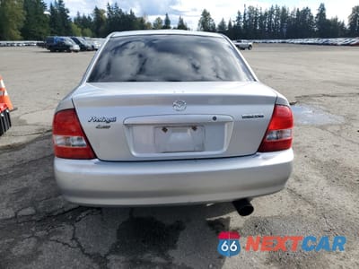 Zdjęcie 6 z 12 samochodu: 2003 MAZDA PROTEGE DX VIN:JM1BJ225130149550 - miniatura