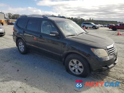 Czwarte zdjęcie samochodu z boku: 2009 KIA BORREGO LX VIN:KNDJJ741X95025646 - miniatura