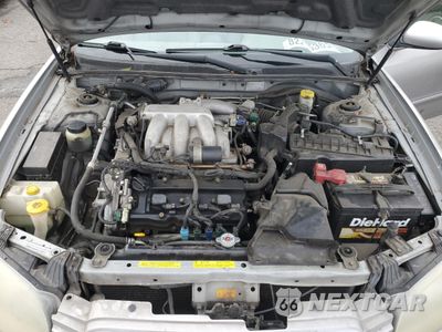 Zdjęcie 11 z 12 samochodu: 2003 NISSAN MAXIMA GLE VIN:JN1DA31A43T427405 - miniatura