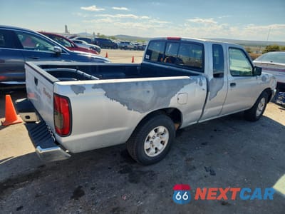 Trzecie zdjęcie samochodu z tyłu: 2000 NISSAN FRONTIER KING CAB XE VIN:1N6DD26SXYC328592 - miniatura