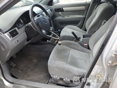Zdjęcie 7 z 12 samochodu: 2004 SUZUKI FORENZA S VIN:KL5JD52Z74K982191 - miniatura