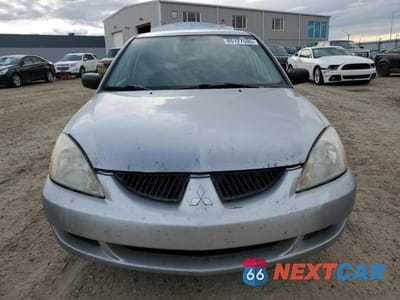 Piąte zdjęcie samochodu w środku: 2003 MITSUBISHI LANCER LS VIN:JA3AJ36EX3U610764 - miniatura