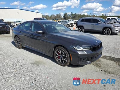 Czwarte zdjęcie samochodu z boku: 2022 BMW 540 XI VIN:WBA73BJ09NWX68643 - miniatura