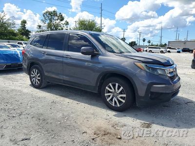 Czwarte zdjęcie samochodu z boku: 2020 HONDA PILOT EX VIN:5FNYF5H33LB018057 - miniatura