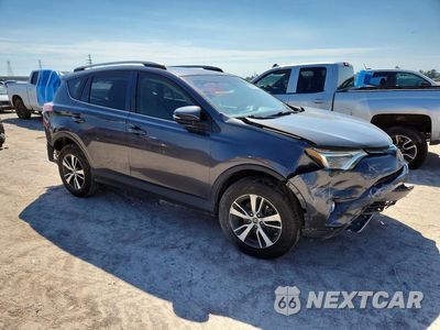 Czwarte zdjęcie samochodu z boku: 2018 TOYOTA RAV4 XLE VIN:JTMWFREV9JJ186151 - miniatura