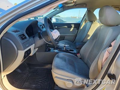 Zdjęcie 7 z 12 samochodu: 2010 FORD FUSION S VIN:3FAHP0GA2AR257729 - miniatura