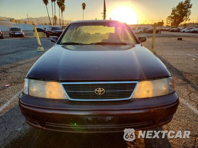Piąte zdjęcie samochodu w środku: 1999 TOYOTA AVALON XL VIN:4T1BF18B8XU306414 - miniatura