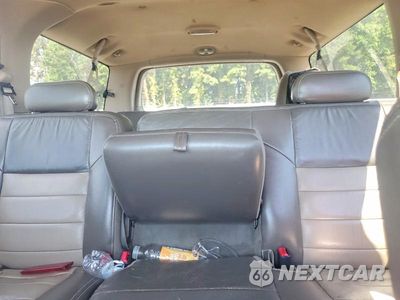 Zdjęcie 10 z 13 samochodu: 2003 FORD EXCURSION EDDIE BAUER VIN:1FMSU45PX3EC79499 - miniatura