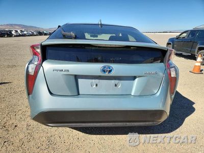 Zdjęcie 6 z 12 samochodu: 2016 TOYOTA PRIUS TWO VIN:JTDKBRFU5G3510290 - miniatura