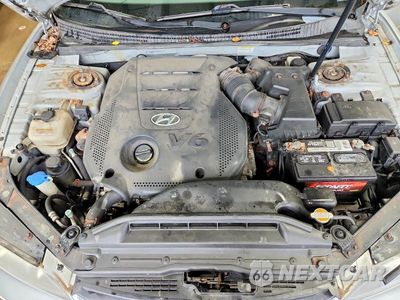 Zdjęcie 11 z 12 samochodu: 2009 HYUNDAI AZERA LIMITED VIN:KMHFC46FX9A369472 - miniatura