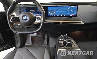 Zdjęcie 9 z 14 samochodu: 2024 BMW IX XDRIVE50 VIN:WB523CF0XRCN85718 - miniatura