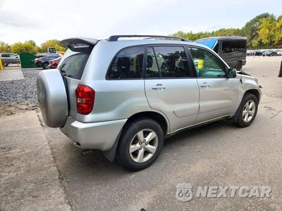 Trzecie zdjęcie samochodu z tyłu: 2004 TOYOTA RAV4 BASE VIN:JTEGD20V740042709 - miniatura