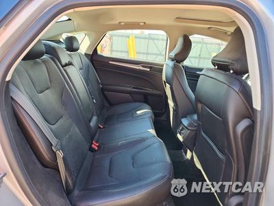 Zdjęcie 10 z 12 samochodu: 2016 FORD FUSION TITANIUM VIN:3FA6P0K90GR379552 - miniatura