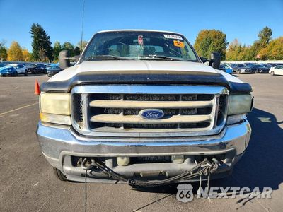 Piąte zdjęcie samochodu w środku: 2002 FORD F350 SRW SUPER DUTY VIN:1FTSW31F12EA94729 - miniatura