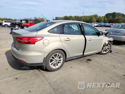 Trzecie zdjęcie samochodu z tyłu: 2016 FORD FOCUS SE VIN:1FADP3F27GL386275 - miniatura