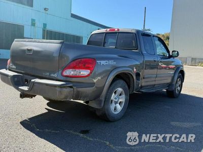 Czwarte zdjęcie samochodu z boku: 2004 TOYOTA TUNDRA LIMITED VIN:5TBBT481748449935 - miniatura