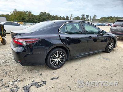 Trzecie zdjęcie samochodu z tyłu: 2024 TOYOTA CAMRY HYBRID SE VIN:4T1G31AKXRU629245 - miniatura