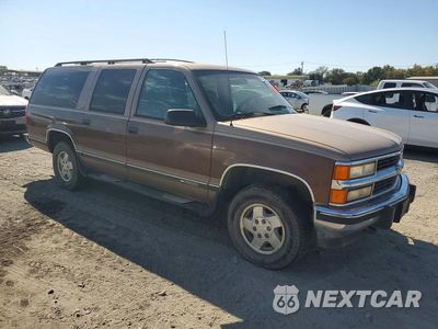 Czwarte zdjęcie samochodu z boku: 1994 GMC SUBURBAN VIN:1GNFK16K4RJ420863 - miniatura