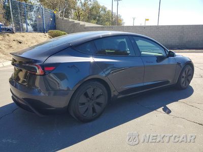 Trzecie zdjęcie samochodu z tyłu: 2024 TESLA MODEL 3 VIN:5YJ3E1EB8RF754390 - miniatura