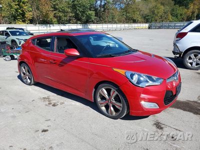 Czwarte zdjęcie samochodu z boku: 2013 HYUNDAI VELOSTER BASE VIN:KMHTC6AD1DU109800 - miniatura
