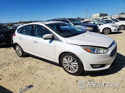 Czwarte zdjęcie samochodu z boku: 2017 FORD FOCUS TITANIUM VIN:1FADP3N25HL230822 - miniatura