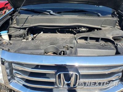 Zdjęcie 12 z 14 samochodu: 2014 HONDA PILOT LX VIN:5FNYF3H22EB017321 - miniatura