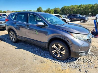 Czwarte zdjęcie samochodu z boku: 2017 HONDA CR-V LX VIN:2HKRW6H33HH212669 - miniatura