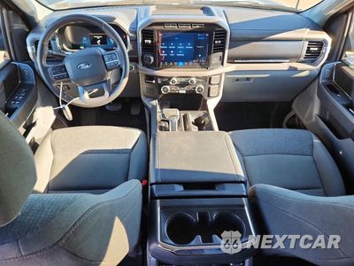 Zdjęcie 8 z 12 samochodu: 2024 FORD F150 LIGHTNING XLT VIN:1FTVW3LK0RWG20523 - miniatura