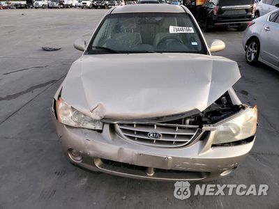 Piąte zdjęcie samochodu w środku: 2006 KIA SPECTRA EX VIN:KNAFE121765233714 - miniatura