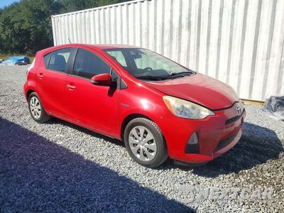 Czwarte zdjęcie samochodu z boku: 2014 TOYOTA PRIUS C TWO VIN:JTDKDTB33E1559629 - miniatura