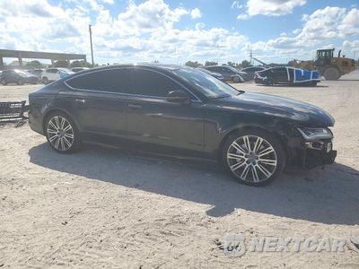 Czwarte zdjęcie samochodu z boku: 2015 AUDI A7 PRESTIGE VIN:WAU2GAFC3FN013703 - miniatura