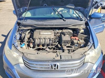 Zdjęcie 11 z 12 samochodu: 2010 HONDA INSIGHT LX VIN:JHMZE2H54AS035679 - miniatura